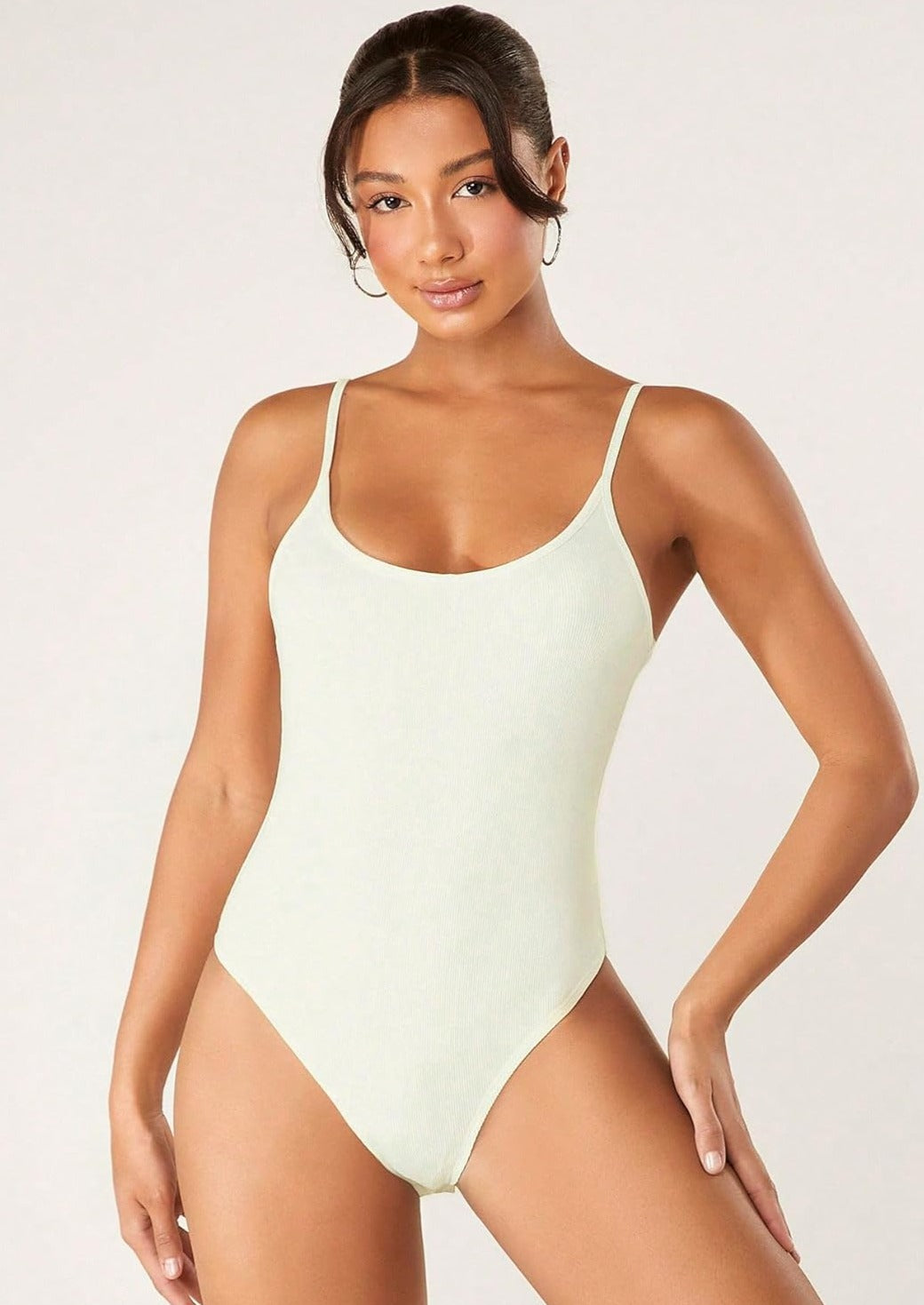 Ribbed tummy control romper in beige with spaghetti straps and scoop neckline