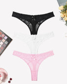 Black, white, and pink mesh lace low-waist thong panties with scalloped lace trim