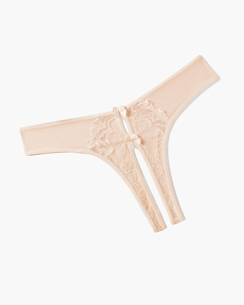Champagne mesh thong-style briefs with lace detail and bow at front, side view