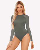 Dark grey turtleneck mesh one-piece leotard with long sleeves