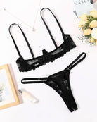 Black lace underwire bra and matching thong set with scalloped lace trim