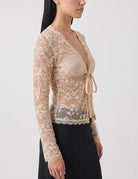 Champagne sheer lace long-sleeve cardigan with deep V tie-front