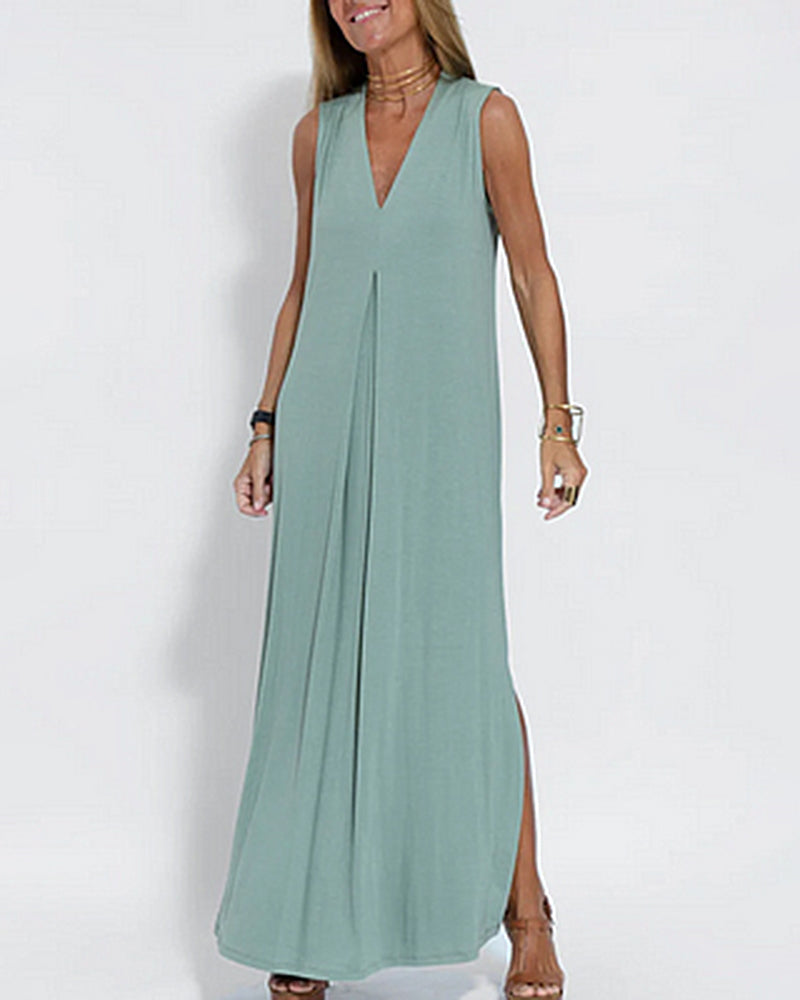Blue-green sleeveless maxi dress with V-neck, long skirt and center pleat detail