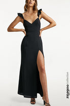 Black ruffle strap maxi dress with V-neck, fitted bodice, and side slit