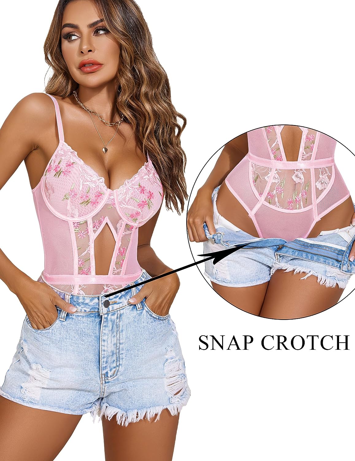 Pink floral embroidered lace-up bodysuit with sheer panels and garter belt, snap crotch