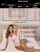 Pink floral embroidered lace bodysuit with garter belt straps and sheer panels