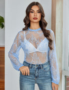 Floral lace mesh top with long sleeves, sheer light blue with scalloped edges