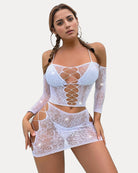 White sparkly fishnet lingerie set with lace-up front crop top and mini skirt