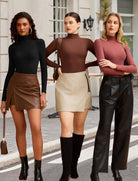 High-neck snap-closure soft bodysuits in black, brown, and rose red with long sleeves
