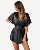 Black satin sleep robe with lace sleeves, V-neck front, and tied waist belt.