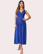 Royal blue lace V-neck chemise with gathered bust and pleated skirt.