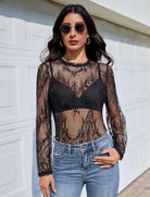 Black sheer lace long-sleeve top with high neck and floral mesh pattern