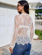Sheer long-sleeve lace mesh top with floral pattern, high neck keyhole back