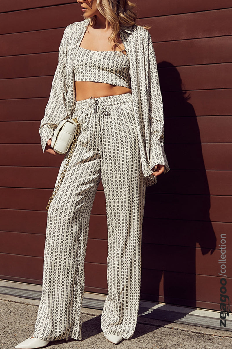 White elastic waist loose pants with allover small geometric print, wide leg