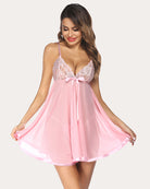 Pink lace babydoll with bow, thin straps, and flowy mesh skirt