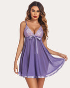 Purple lace-trim babydoll with heart-pattern straps, bow front, sheer flare skirt