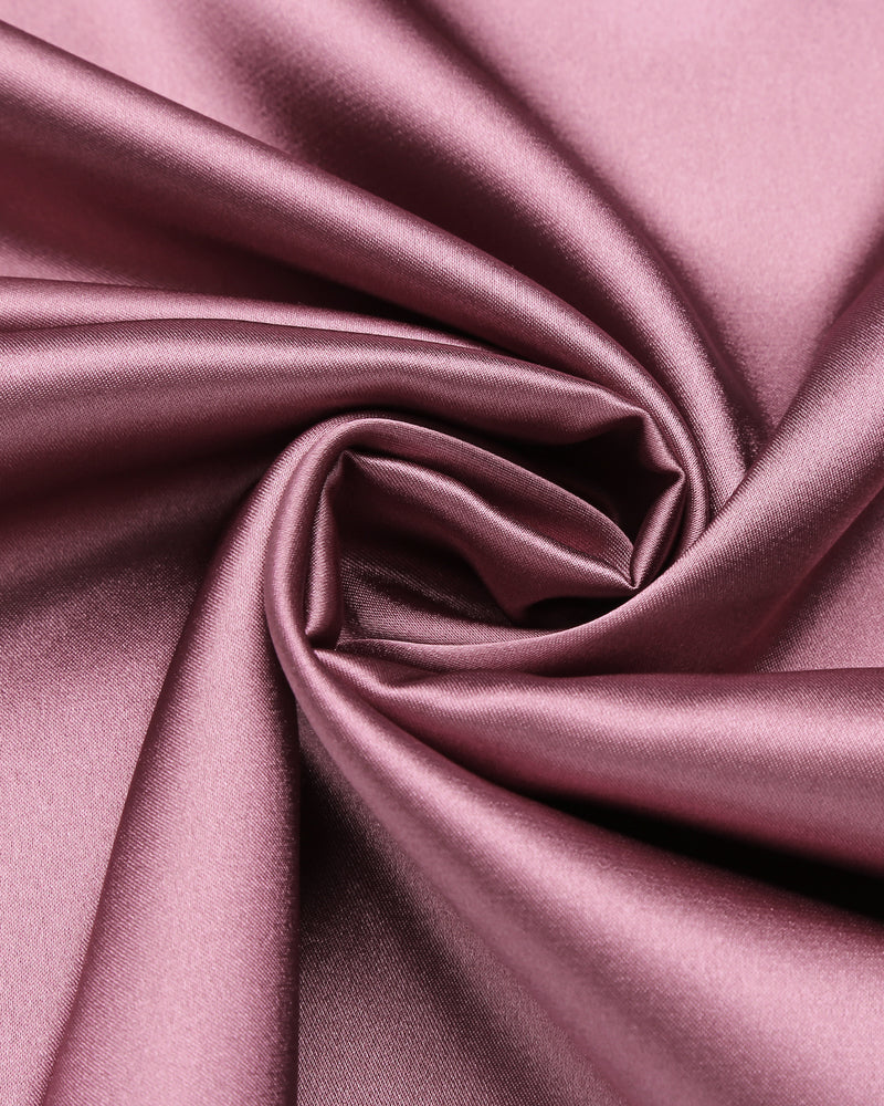 Lilac satin fabric close-up with soft sheen and folds