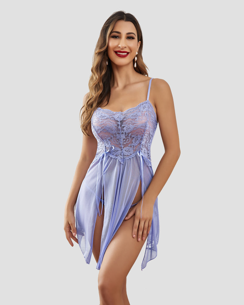 Lavender lace babydoll dress with thin straps, embroidered bodice, and sheer skirt
