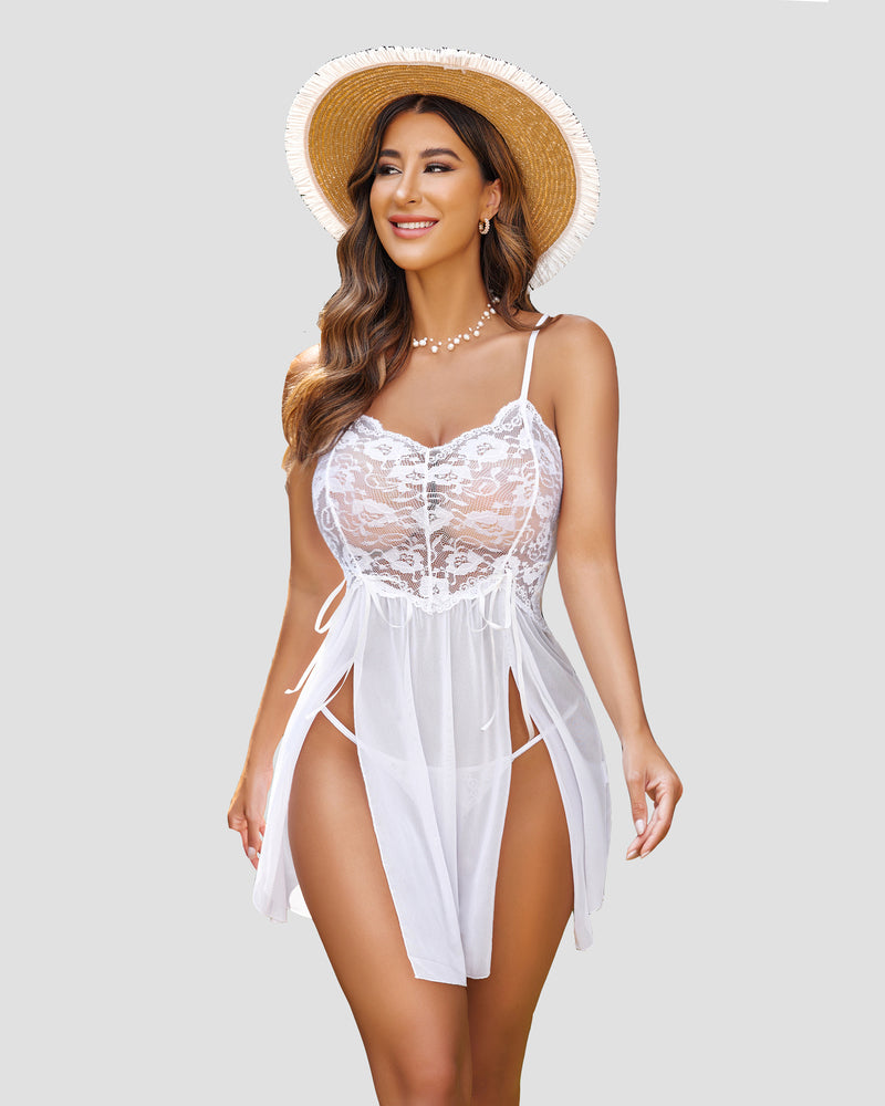 White lace babydoll dress with thin straps, corset bodice, and asymmetrical sheer sides