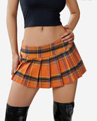 Orange plaid mini pleated skirt with elastic waistband