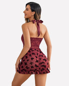 Open-front halter nighty in burgundy lace with bow tie at the back and ruffled hem