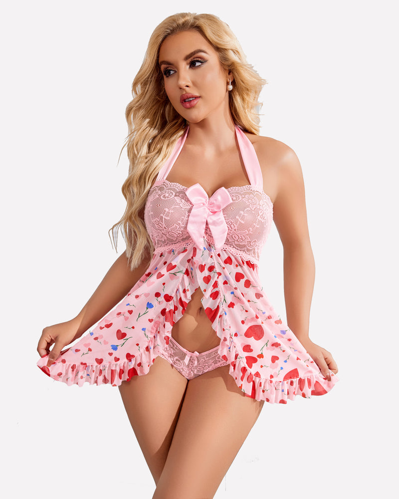 Open-front halter nighty in light pink with lace bust, bow tie, and heart print skirt