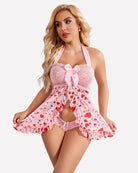 Open-front halter nighty in light pink with lace bust, bow tie, and heart print skirt