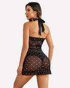 Open-front halter nighty in black lace with bow tie back and glitter mesh ruffle hem