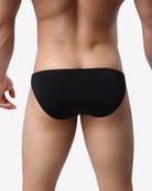 Men's low-rise stretch nylon briefs, black, front view