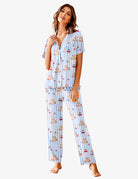 Blue striped pajama set with short-sleeve shirt and long pants, cartoon bear print