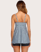 Two-piece tankini set with printed open-back tank and black swim shorts, back view