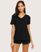 Black V-neck pajama top with matching black shorts, pull-on style.