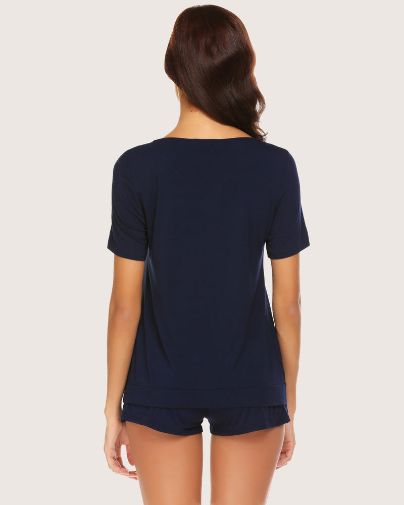 Back view navy blue short-sleeve pajama set with V-neck top and drawstring shorts