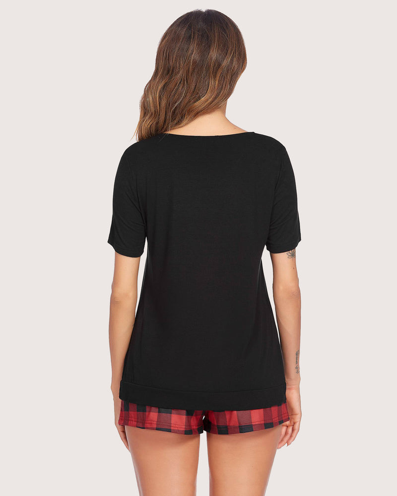 Black short-sleeve pajama set with red plaid shorts, shown from back
