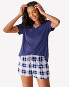Blue short-sleeve pajama top with blue-and-white plaid shorts pajama set
