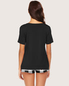 Black V-neck T-shirt pajama set with plaid shorts, back view