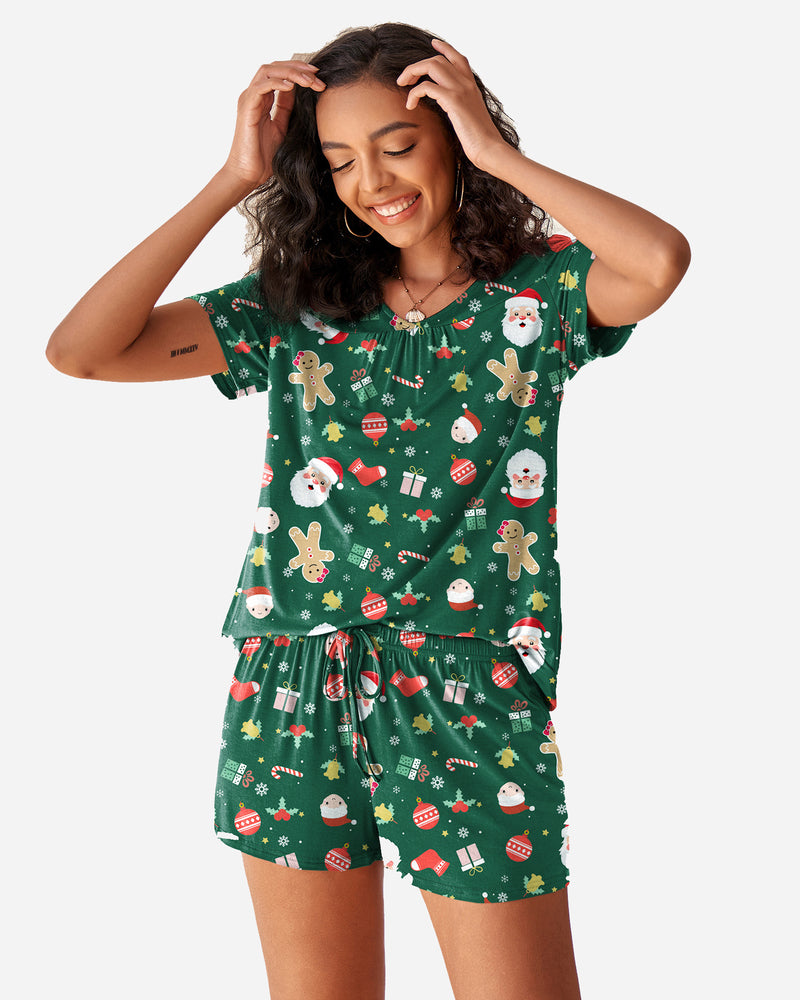 Green Christmas pajama set with gingerbread, snowman and candy prints; drawstring shorts