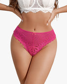 Lace cheeky panties in magenta pink with scalloped edges and small bow at center