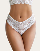 White lace cheeky panties with scalloped lace trim and center tie at waistband