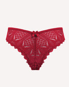 Red lace thong with scalloped edges and small center bow at waistband