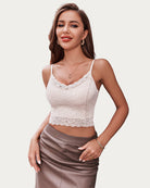 Light pink lace spaghetti strap tank top with scalloped V-neck lace hem