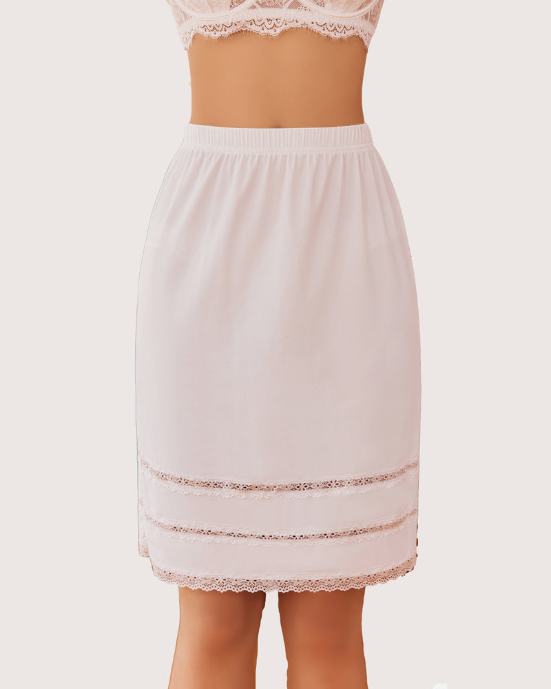 White lace-trim knee-length skirt with elastic waistband and layered hem edges
