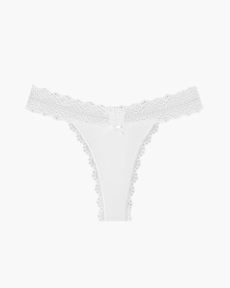 White lace waist thong with ribbed T-back, scalloped lace sides and center bow