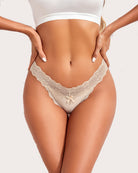 Lace waist thong panties in off-white, back view with lace and bow detail
