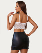 White lace bralette crop top with open back, adjustable straps, and scalloped hem