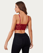 Wine red lace bralette crop top with open back, adjustable straps, and lace trim