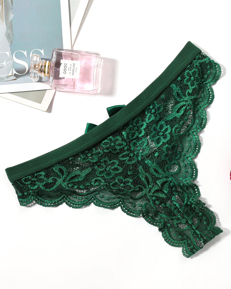 Green lace T-back thong with scalloped trim and center bow, side view