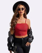 Red spaghetti-strap tank top with scoop neckline and ruched lower hem