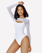White long-sleeve bodysuit with oval chest cutout and fitted thong back