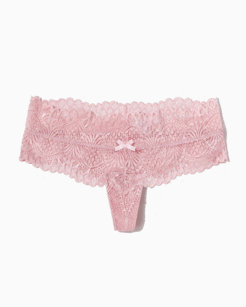 Low-waist lace thong in pink with scalloped lace edges and small bow detail